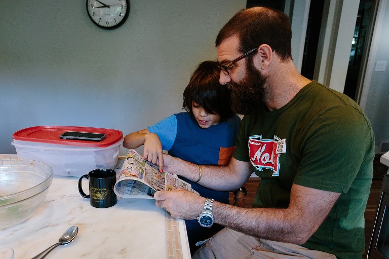 Sharing the comics with Dad 