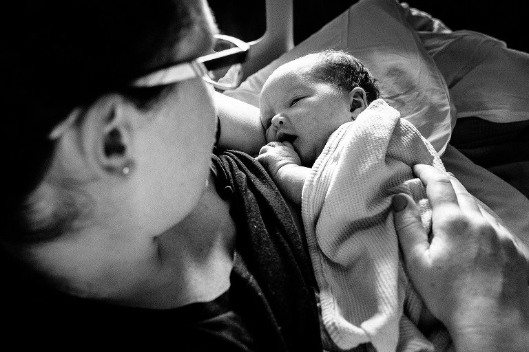 Newborn makes eye contact with mother 