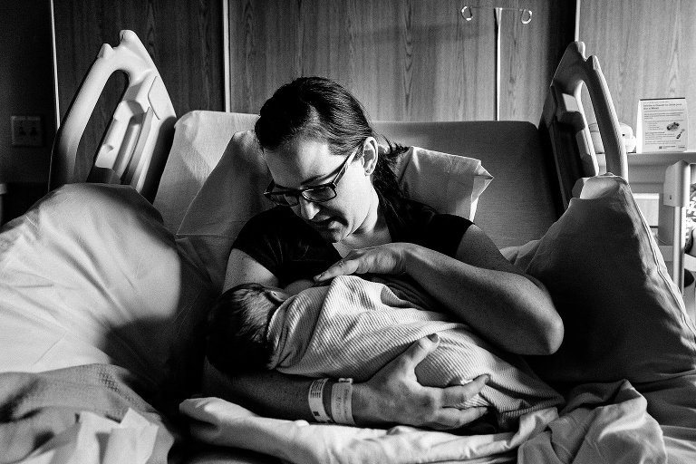 Mother nurses newborn 