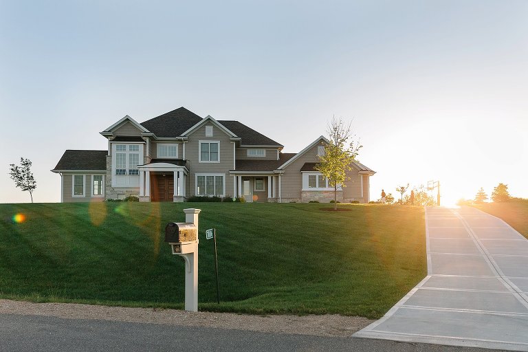 mom and dad clean up chalk outside. Kids in bed, summer sun still up