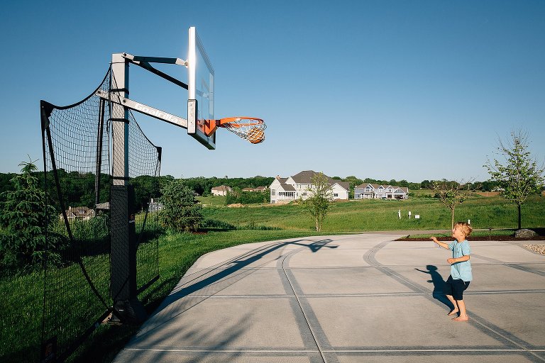 Preschool boy makes a basket. Basketball. 