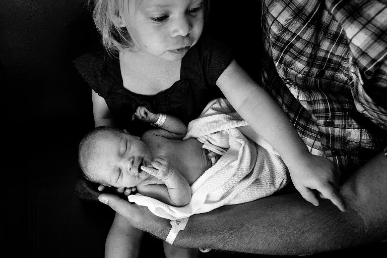 both toddler and newborn use pointer finger 