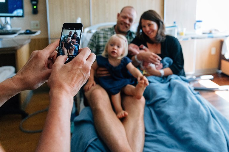 Grandma takes family photo