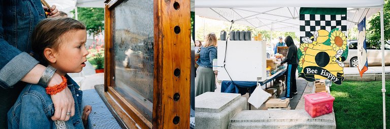 Girl looks for Queen Bee in glass hive 