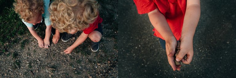 Boys gather rocks to throw in the lake. 