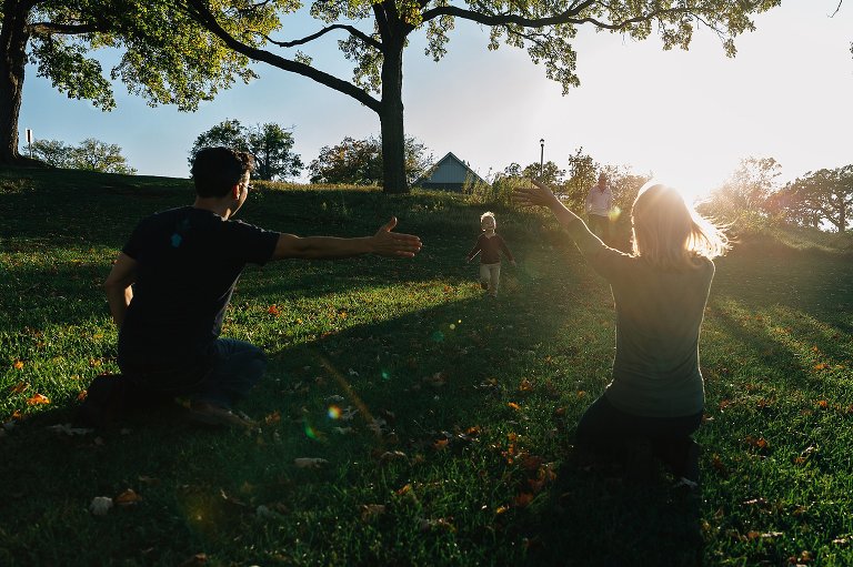Boy runs to both parents with open arms