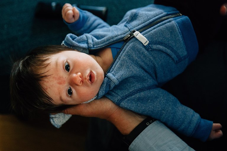 Alert baby makes eye contact with camera. 