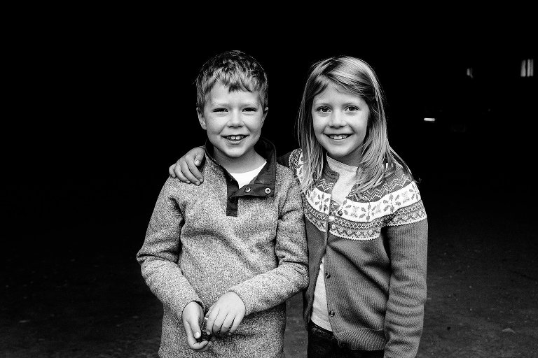 Black and white. Portrait of 7yo twins.