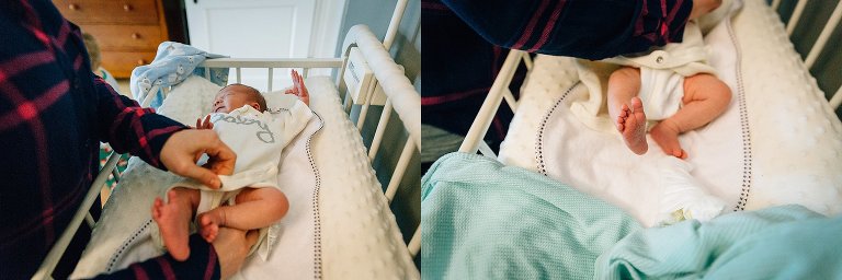 Mother changes newborn clothes on a changing table. Detail of newborn feet. 