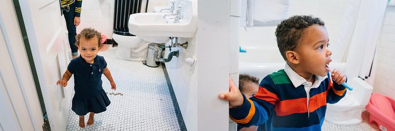 Two kids brush their teeth in a bright white bathroom. 
