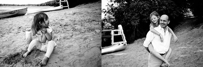 Black and white. 2yo on beach; Dad holds girl on his back.