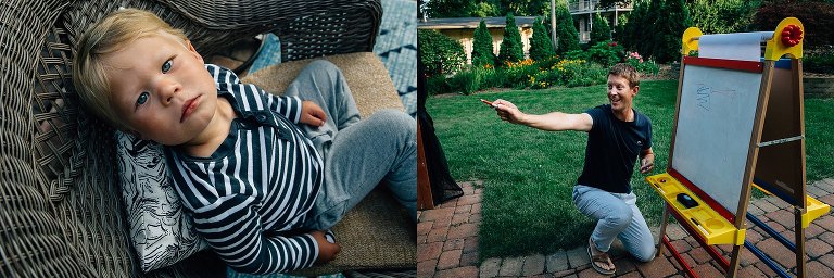 Man points out of frame while drawing for Pictionary. 