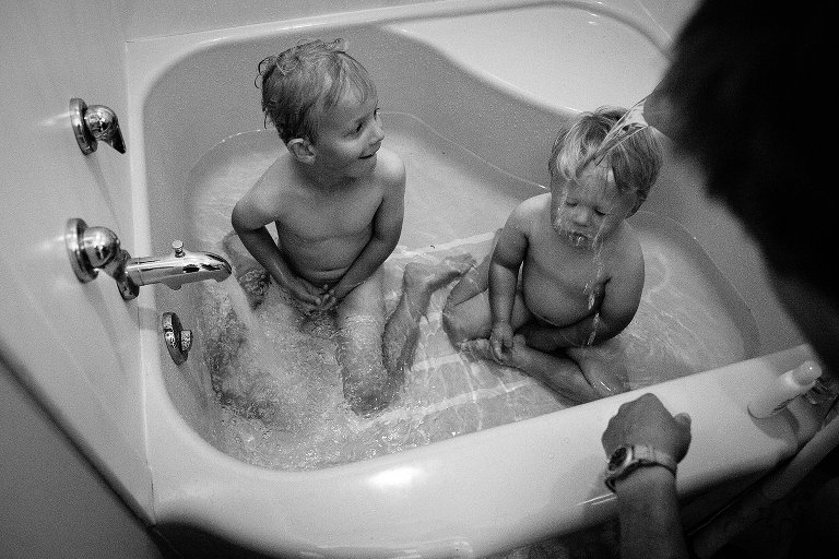 Black and white. Two boys.