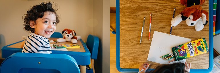 Girl sits at a desk and illustrates her puppy stuffed animal 