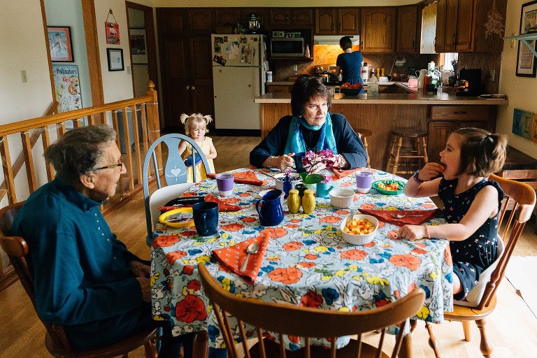 Four generations gather in kitchen