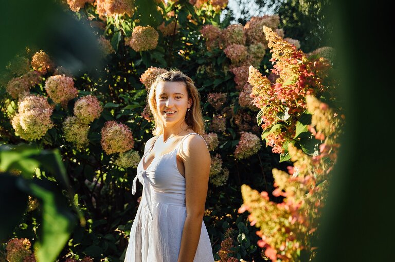 high school senior pictures at UW Arb near hydrangea bushes