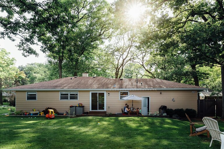 Sun is high in the trees for this backyard summer dinner.