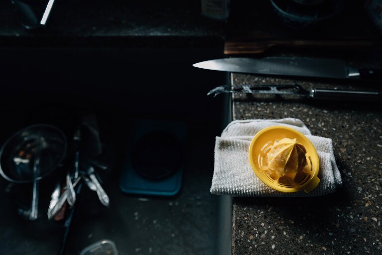 detail of lemon juicer in window light 