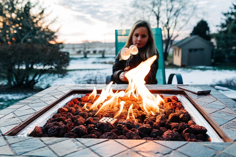 marshmallows roasting over a fire in winter