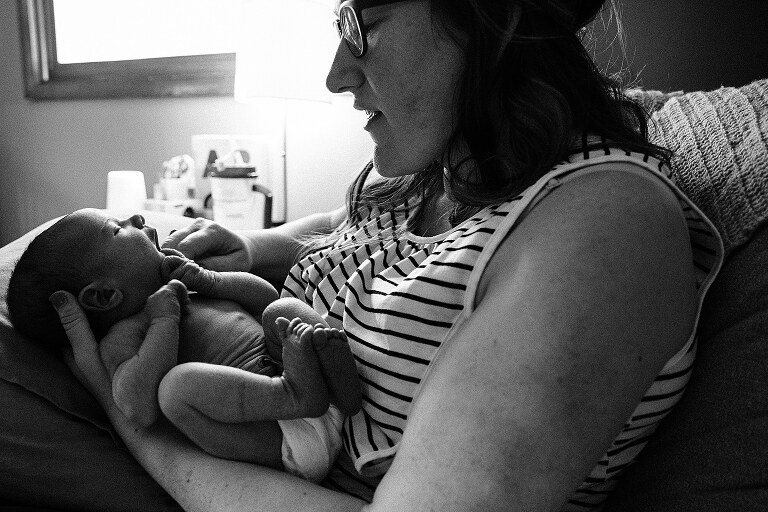 black and white. Mom and newborn profiles
