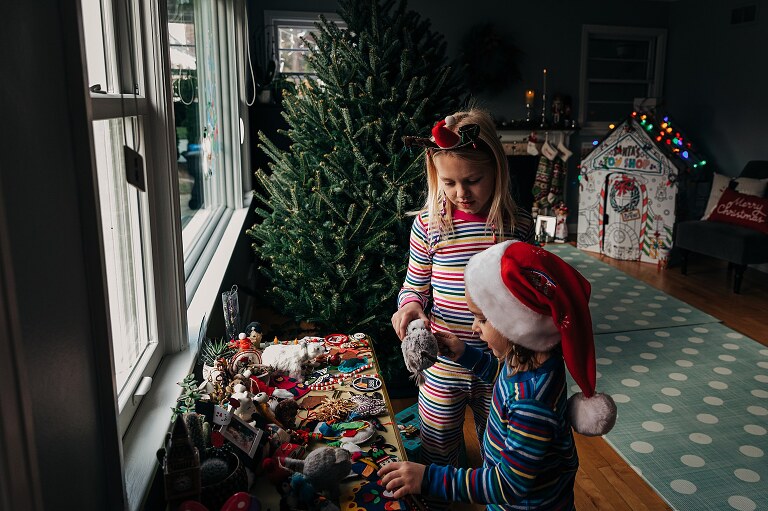 kids holding christmas photos