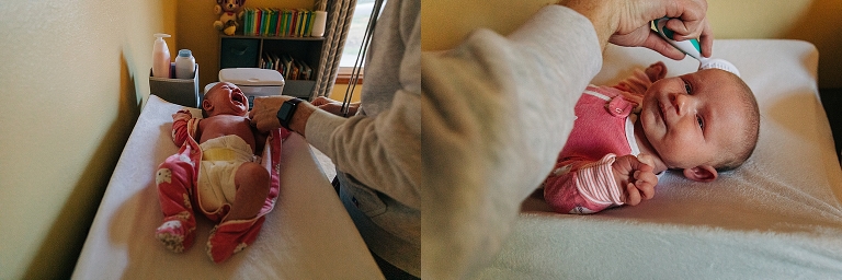 Father cares for newborn by putting on onesie, brushing hair 