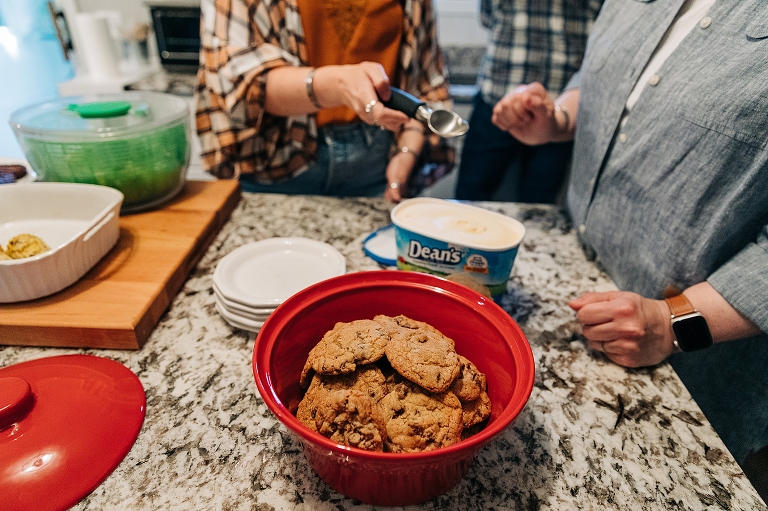 Top diagonal: homemade cookies and Dean's ice cream as daughter passes scoop to mother in background