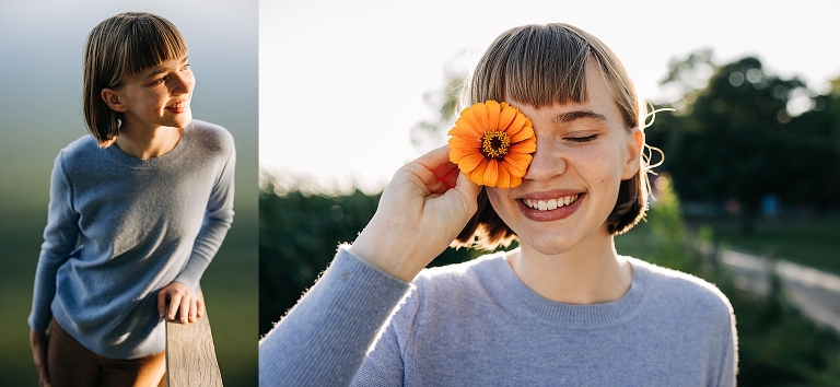 senior girl holding flower over eye