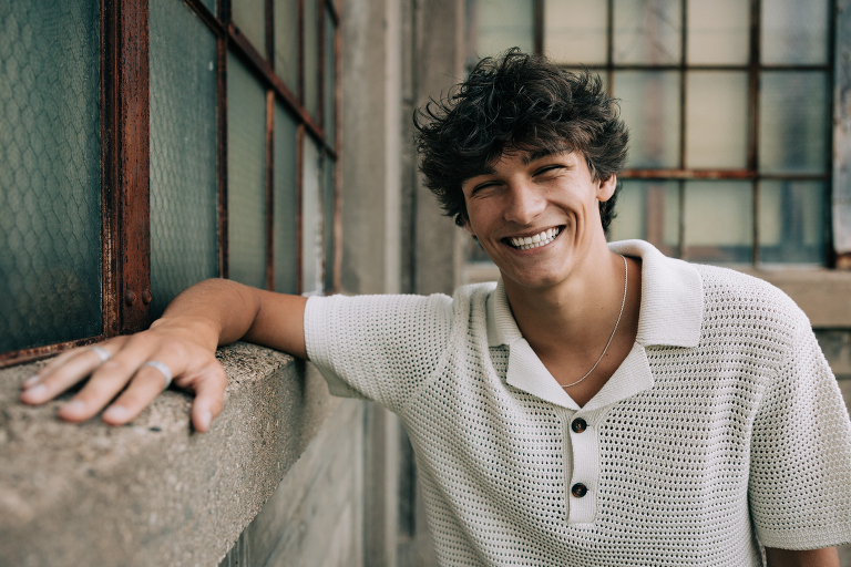 smiling high school senior portrait boy