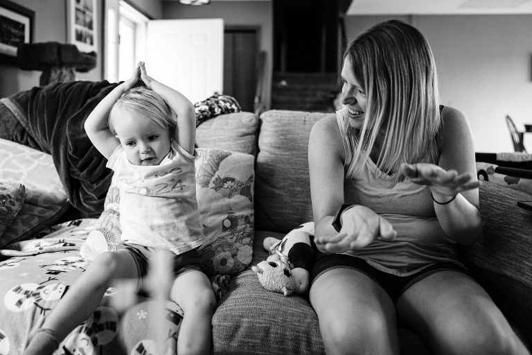 mom and daughter gesture to the song "baby shark"